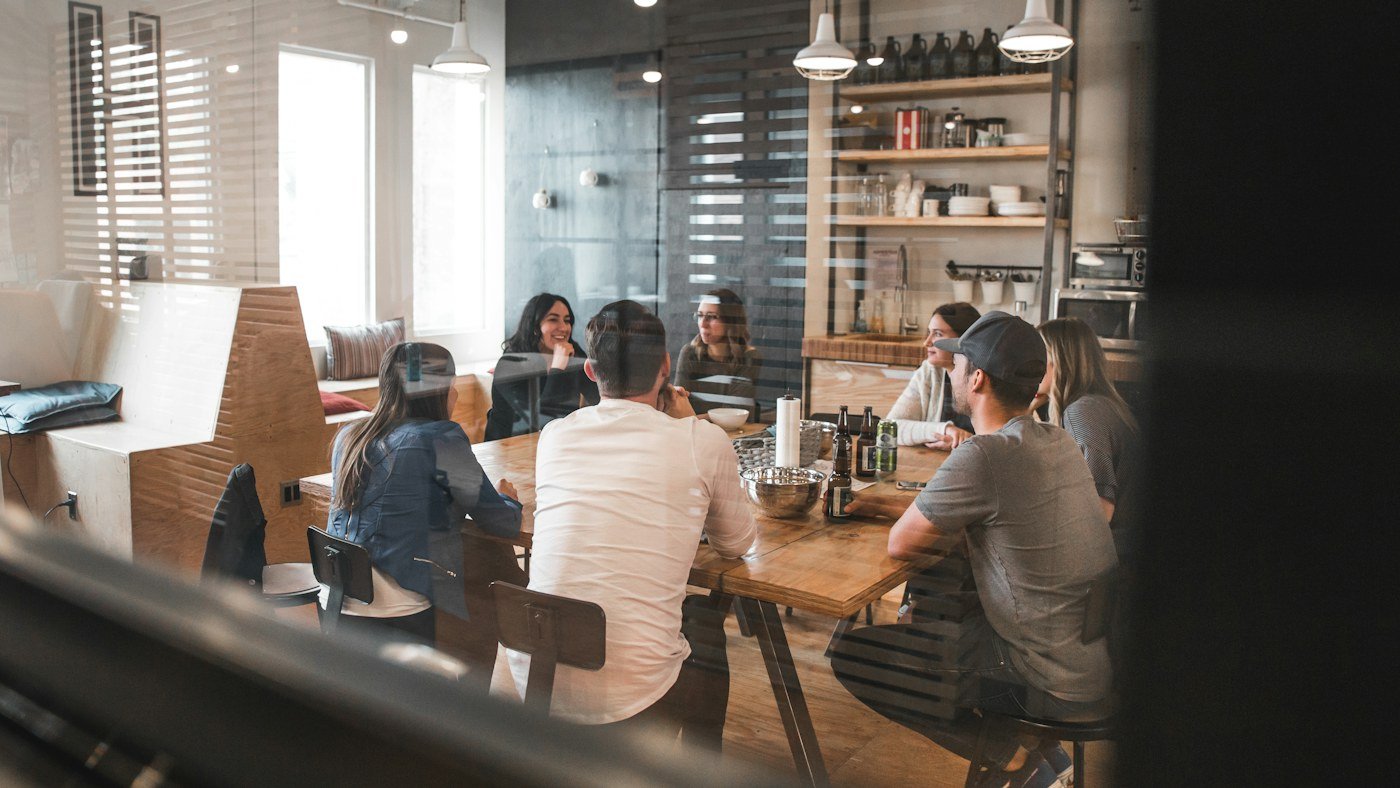 Team members collaborating around a shared table